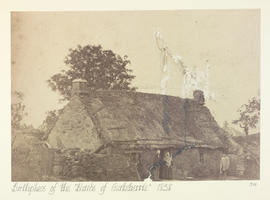 Birthplace of the Bairds of Gartsherrie, 3 people outside cottage
