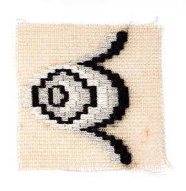 Sampler with eye shaped design (Version 1)