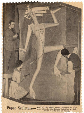 Press cutting - Leonard Clegg, Christine Cramond and Tony Brook preparing a decorative paper figu...
