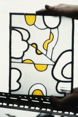 Slide of white and yellow stained glass panel
