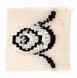 Sampler with eye shaped design (Version 2)
