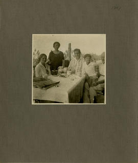 Photograph of Baltus alongside four people