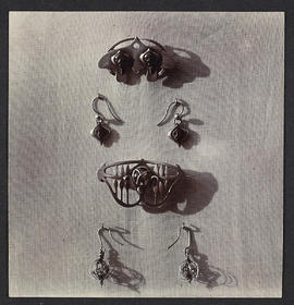 Two brooch and earring sets